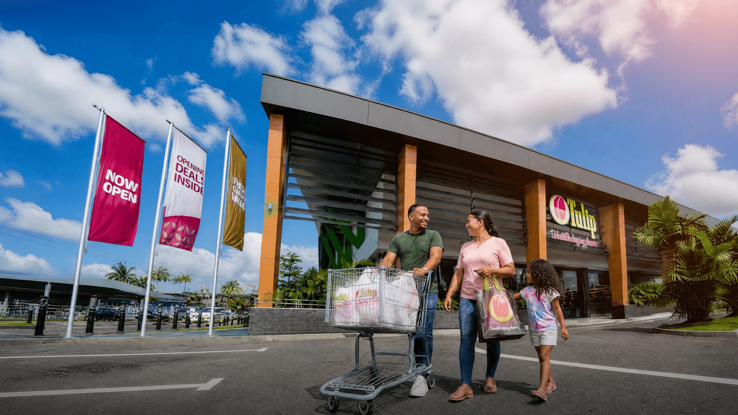 Family leaving Tulip Supermarket with their groceries